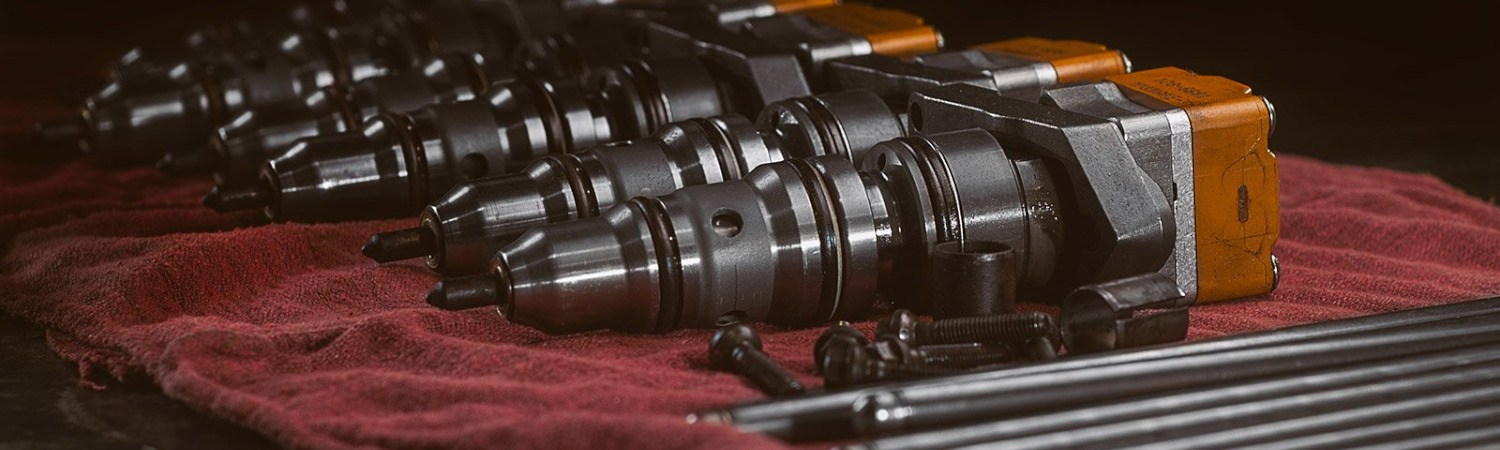 A closeup of truck parts on a table. 